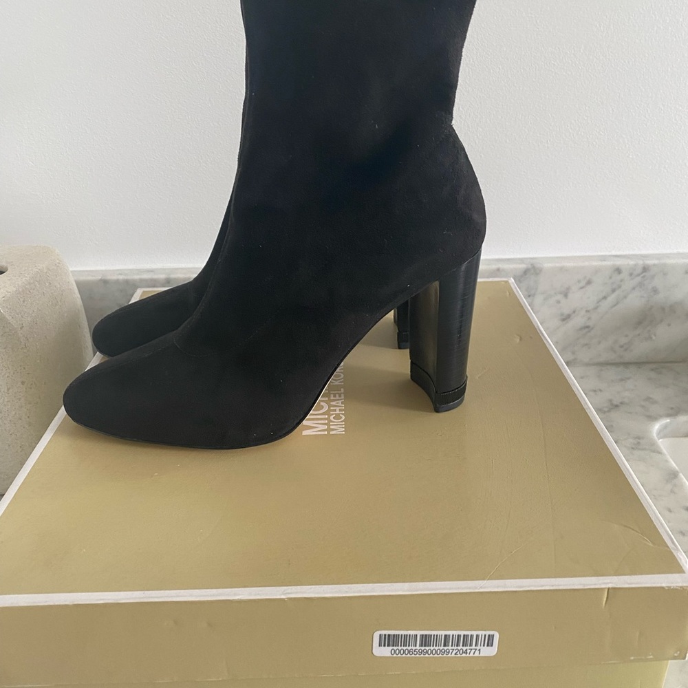 Michael Kors sock booties.